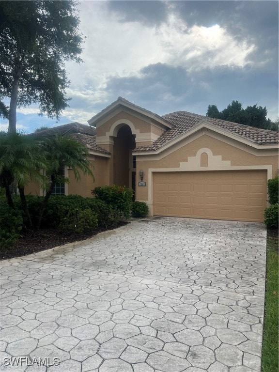 view of front of home with a garage