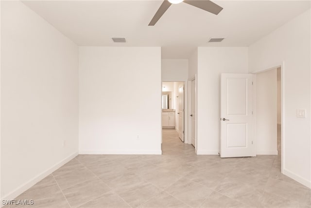 unfurnished room with ceiling fan