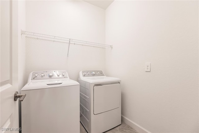 laundry room with washer and dryer