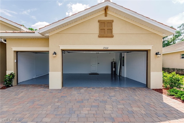 garage featuring water heater