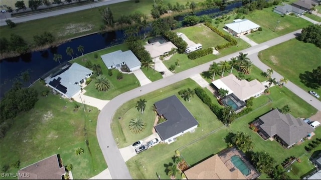 drone / aerial view featuring a water view