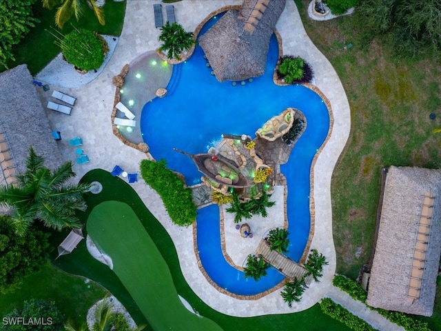 view of swimming pool with a patio and a jacuzzi