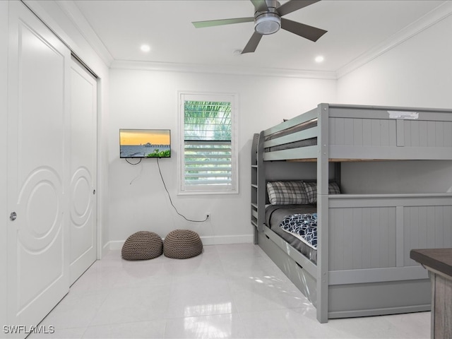 bedroom with ceiling fan and crown molding