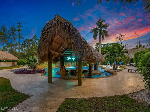 surrounding community with a patio and a gazebo