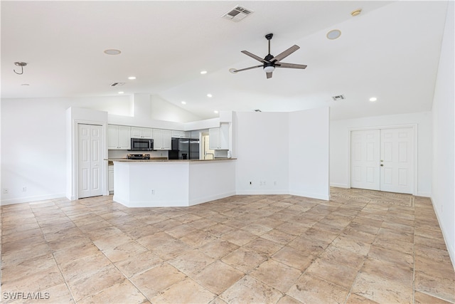 unfurnished living room with lofted ceiling and ceiling fan