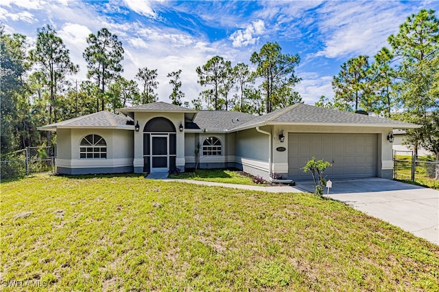 ranch-style home featuring a front lawn and a garage