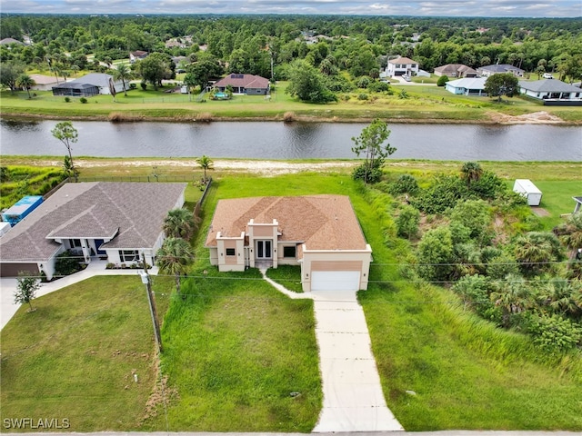 drone / aerial view featuring a water view