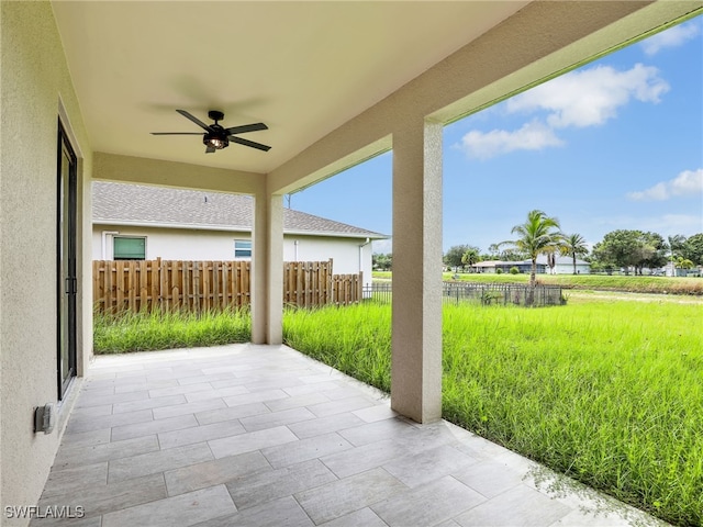 view of patio / terrace featuring ceiling fan