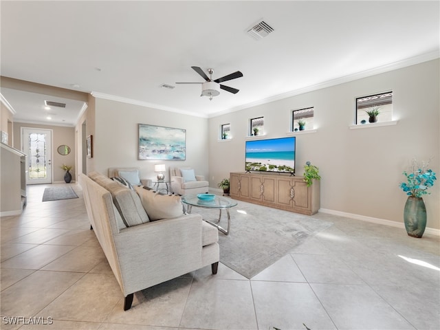 tiled living room with crown molding and ceiling fan