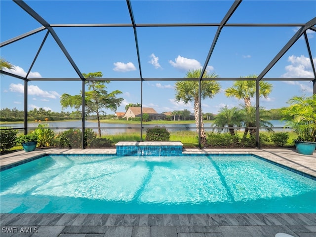 view of swimming pool featuring a lanai, a water view, and pool water feature