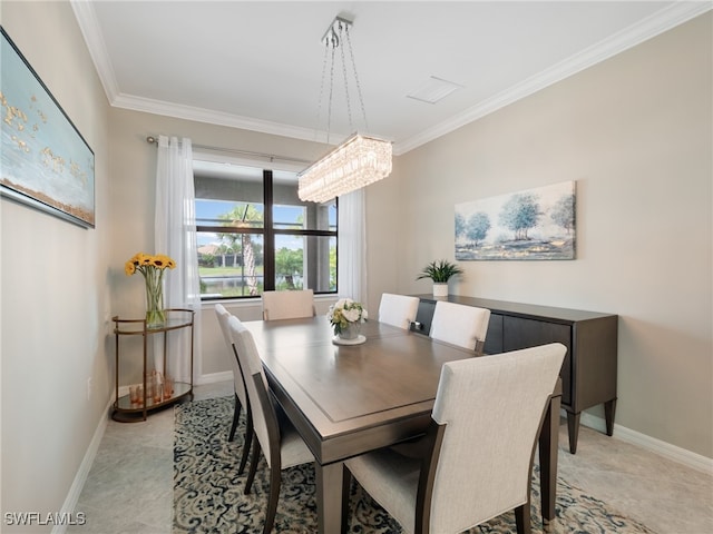 dining space with light tile patterned floors, an inviting chandelier, and ornamental molding