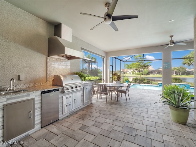 view of patio featuring area for grilling, a water view, a lanai, ceiling fan, and sink