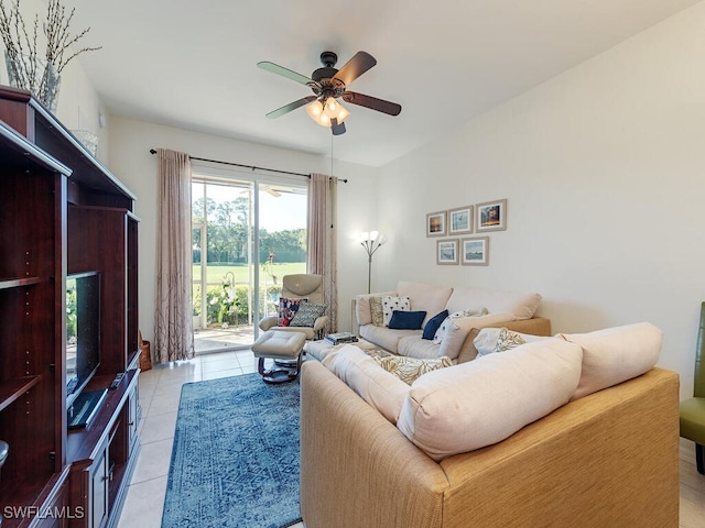 living room with light tile patterned flooring and ceiling fan