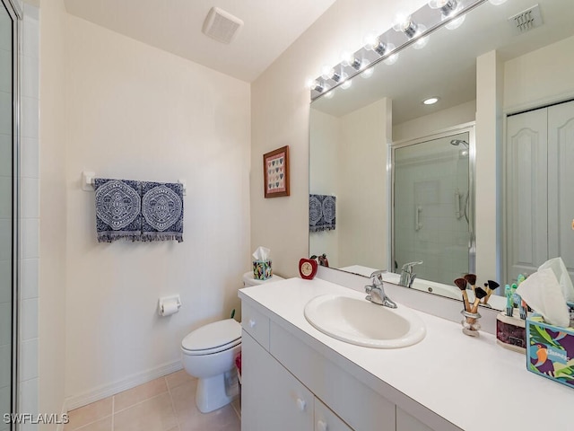 bathroom with vanity, a shower with shower door, toilet, and tile patterned floors