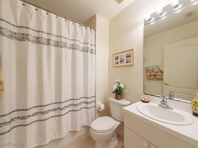 full bathroom with shower / bath combo, tile patterned flooring, vanity, and toilet