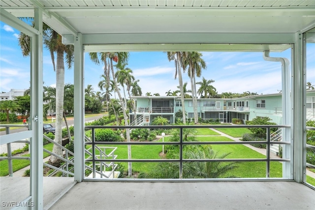 unfurnished sunroom with a healthy amount of sunlight