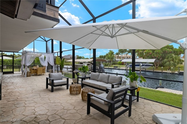 view of patio / terrace featuring outdoor lounge area, a water view, a lanai, and outdoor dining area