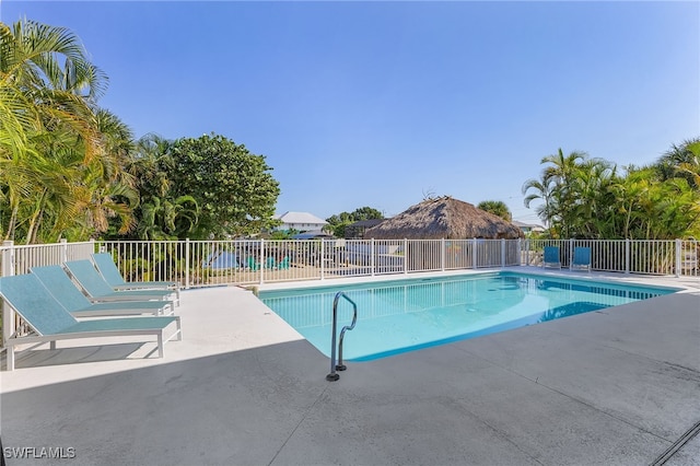 view of swimming pool featuring a patio