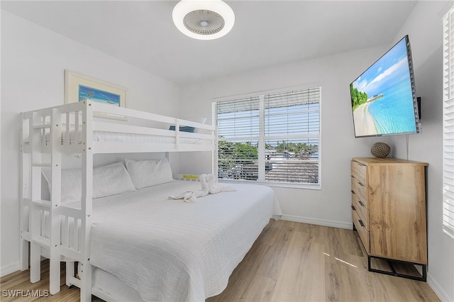 bedroom with light hardwood / wood-style floors