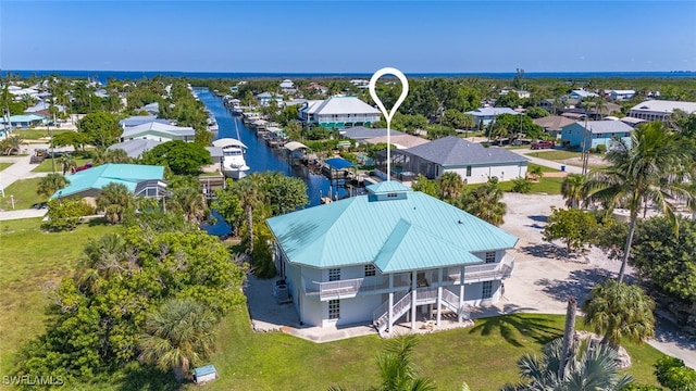 bird's eye view with a water view