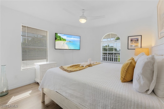 bedroom featuring ceiling fan and light hardwood / wood-style floors