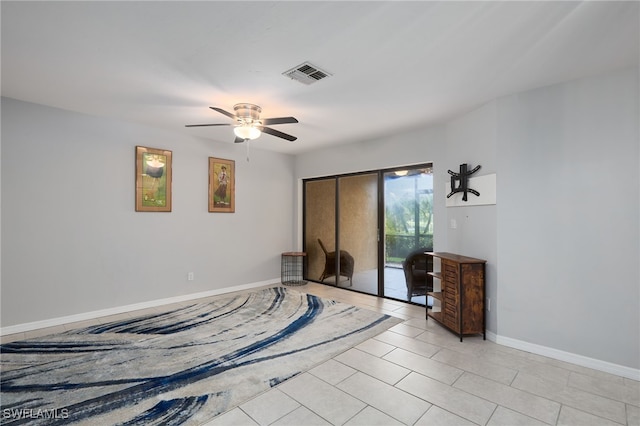 bedroom featuring light tile patterned floors, access to outside, and ceiling fan