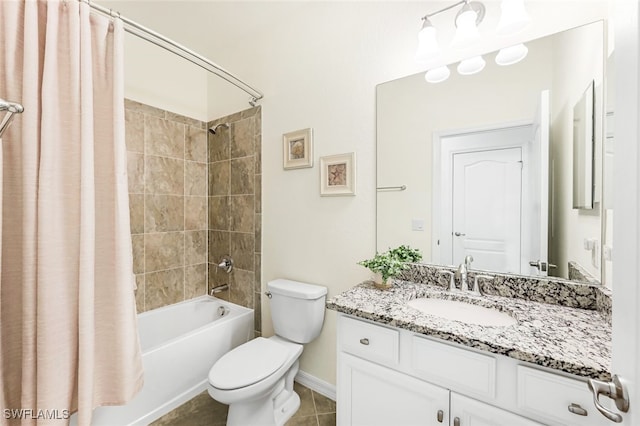 full bathroom featuring tile patterned flooring, vanity, shower / tub combo, and toilet