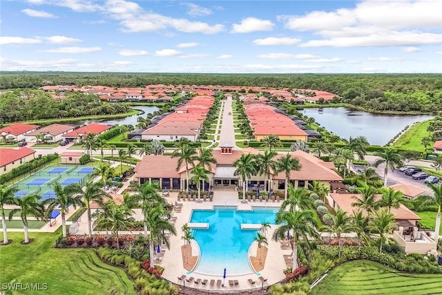 birds eye view of property featuring a water view