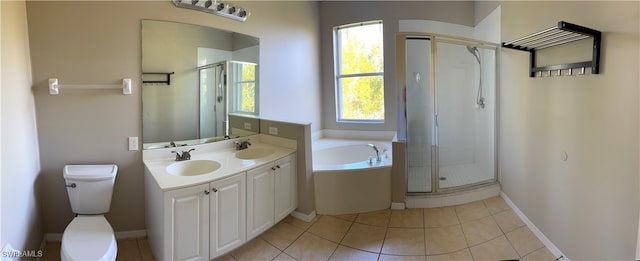 full bathroom featuring vanity, toilet, tile patterned floors, and independent shower and bath