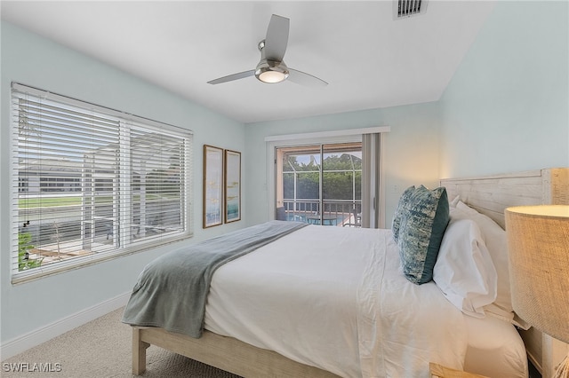 carpeted bedroom with ceiling fan and access to exterior