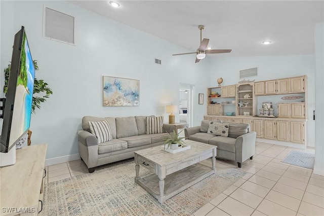 living room featuring light tile patterned flooring, high vaulted ceiling, and ceiling fan