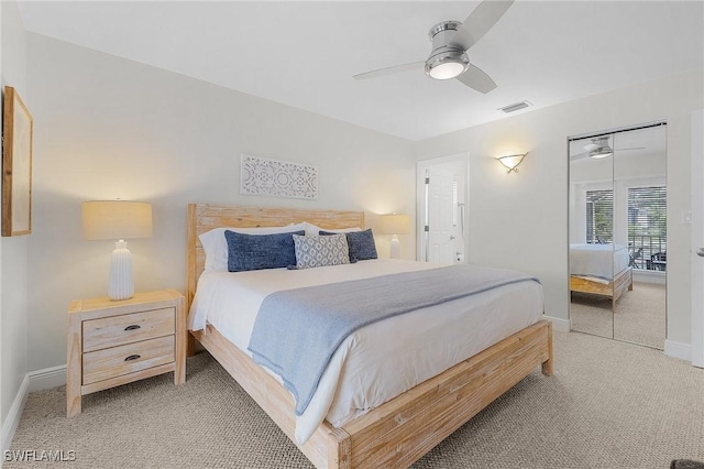 carpeted bedroom with ceiling fan