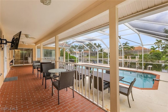 sunroom / solarium with a swimming pool