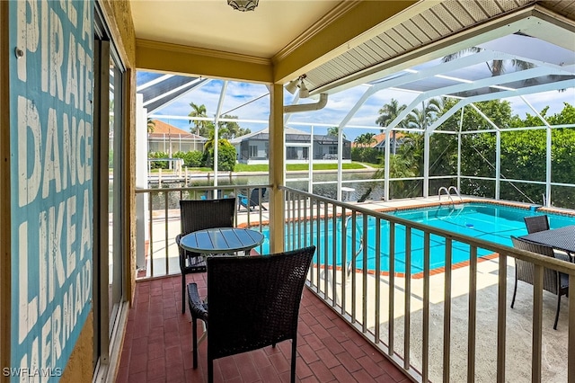 view of pool featuring a lanai and a patio area