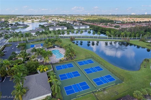 birds eye view of property featuring a water view