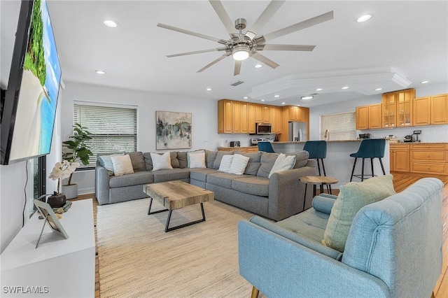 living room featuring ceiling fan