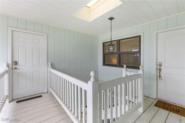 entrance to property featuring a porch