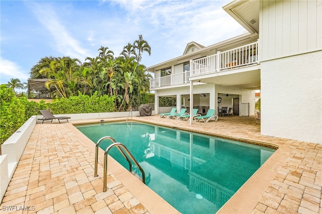 view of pool featuring a patio