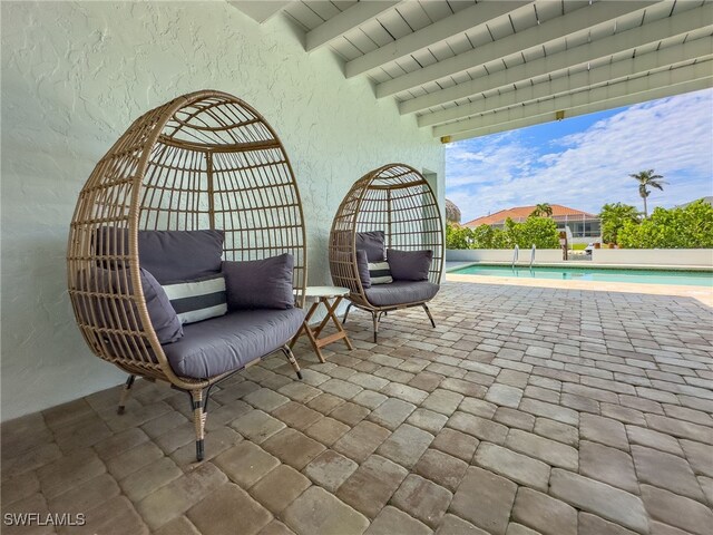 view of patio / terrace featuring a fenced in pool