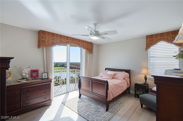 bedroom with access to outside, light wood-type flooring, and ceiling fan