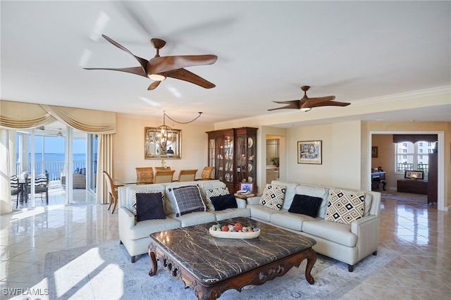 living room featuring crown molding, light tile patterned flooring, a water view, and ceiling fan with notable chandelier