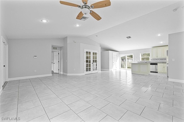 unfurnished living room featuring french doors, vaulted ceiling, ceiling fan, and light tile patterned floors