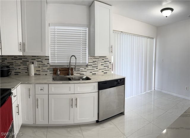 kitchen with dishwasher, sink, decorative backsplash, and white cabinetry