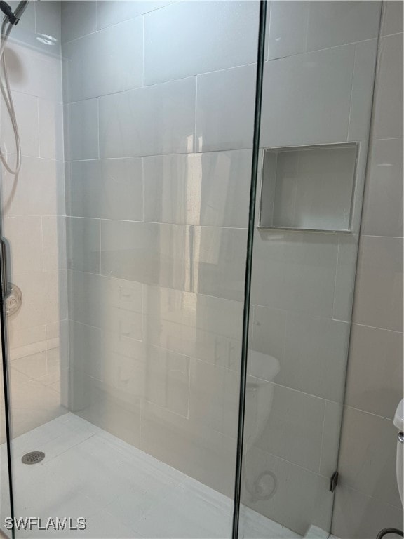 bathroom featuring walk in shower