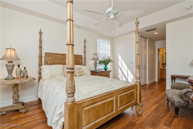 bedroom featuring dark hardwood / wood-style floors and ceiling fan