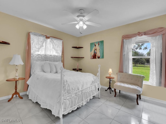 bedroom featuring ceiling fan