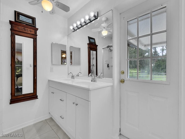 bathroom featuring walk in shower and vanity