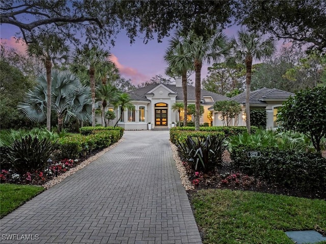 mediterranean / spanish home with french doors