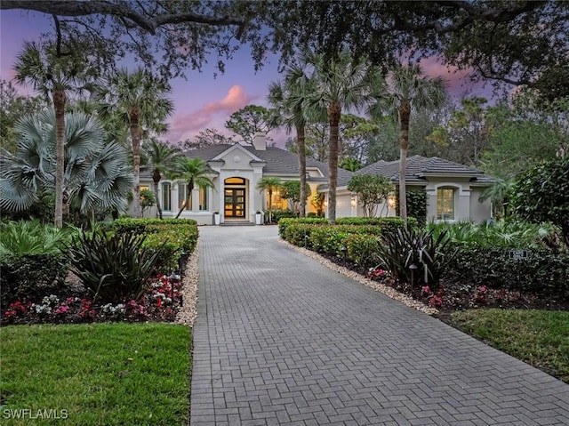 mediterranean / spanish home with french doors