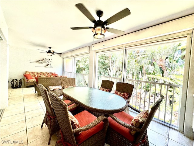 sunroom / solarium with ceiling fan